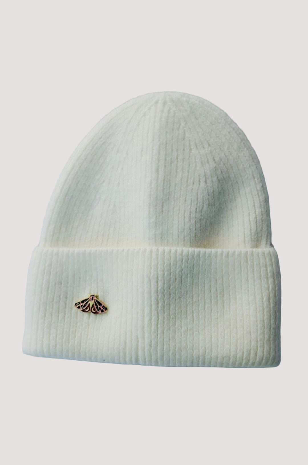 Ivory White knit angora beanie with a small butterfly brooch on the side.