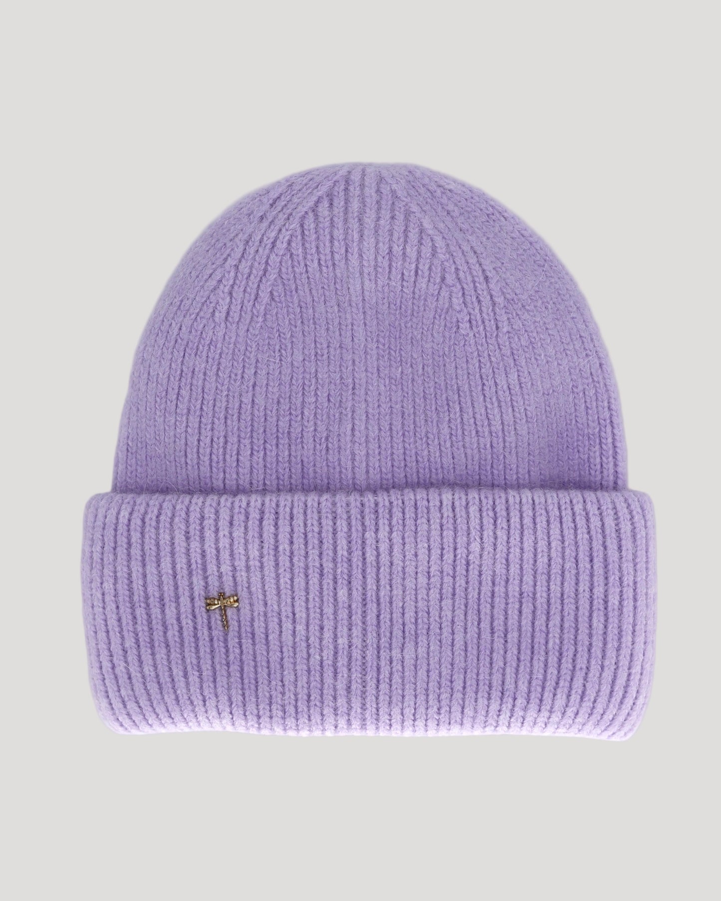 A soft lavender colored beanie hat made from a blend of angora and sheep wool with a ribbed texture.