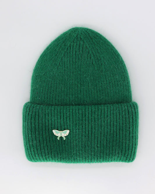 This Hat is a finest hat with a classic silhouette. A luxurious accessory for women made from the softest natural angora and sheep wool for extreme comfort and warmth. It is made in a trendy kelly green color accompanied by an elegant pin. This product is sourced and manufactured in Poland.