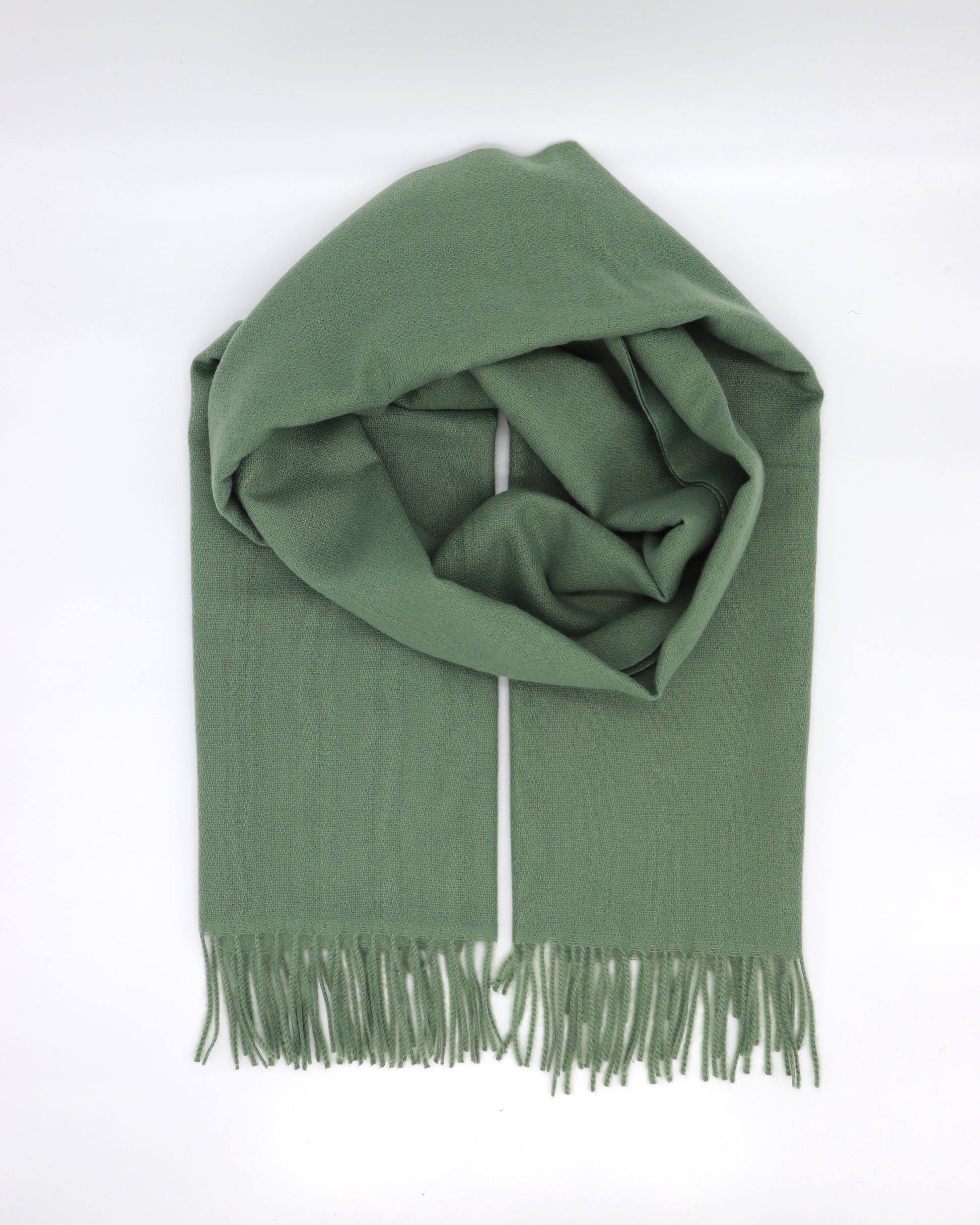 This Scarf is a finest XL-Size soft scarf from Villanelle. A luxurious accessory for women made from the softest wool and cashmere blend for extreme comfort and warmth. It is made in a trendy olive green color for a great look and feeling. A cozy accessory for cold winter, autumn and spring days. This product is sourced and manufactured in Poland.