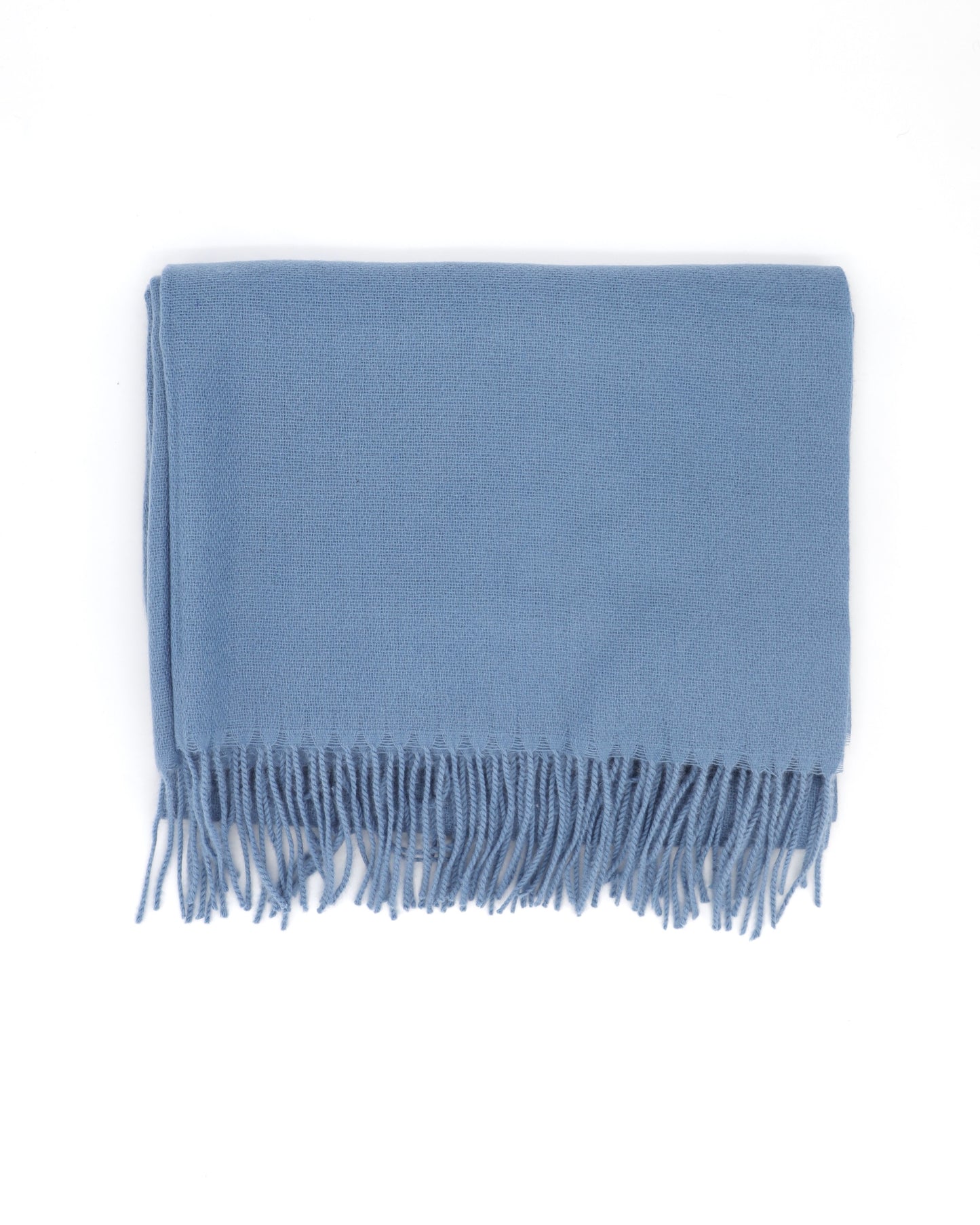 This Scarf is a finest XL-Size soft scarf from Villanelle. A luxurious accessory for women made from the softest wool and cashmere blend for extreme comfort and warmth. It is made in a trendy stone blue color for a great look and feeling. A cozy accessory for cold winter, autumn and spring days. This product is sourced and manufactured in Poland.