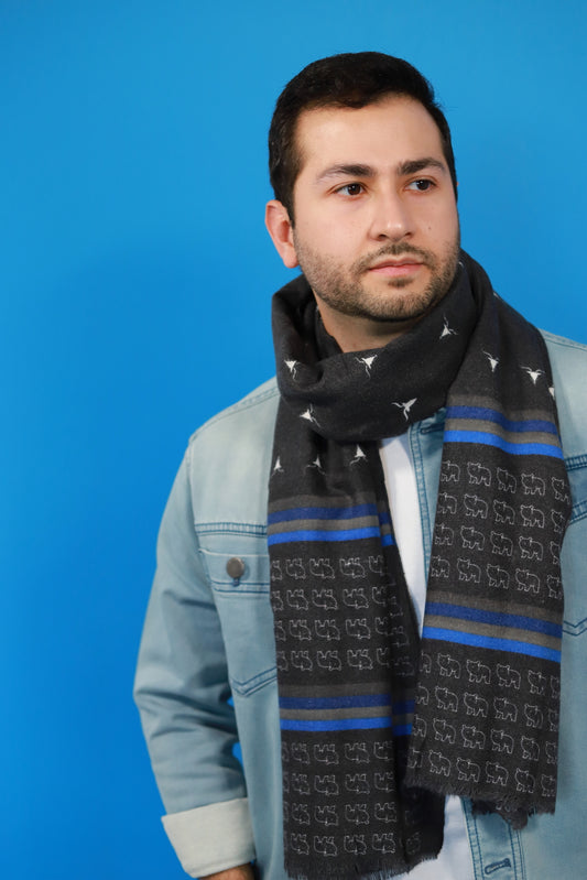 This is a soft and warm cotton scarf for men and for women with modern print of bears and reindeers in  black made from a special cotton blend that gives you a wonderful cashmere-like feeling without hurting animals. This is a completely vegan and cruelty free scarf certified by PETA and a perfect gift idea for men. 