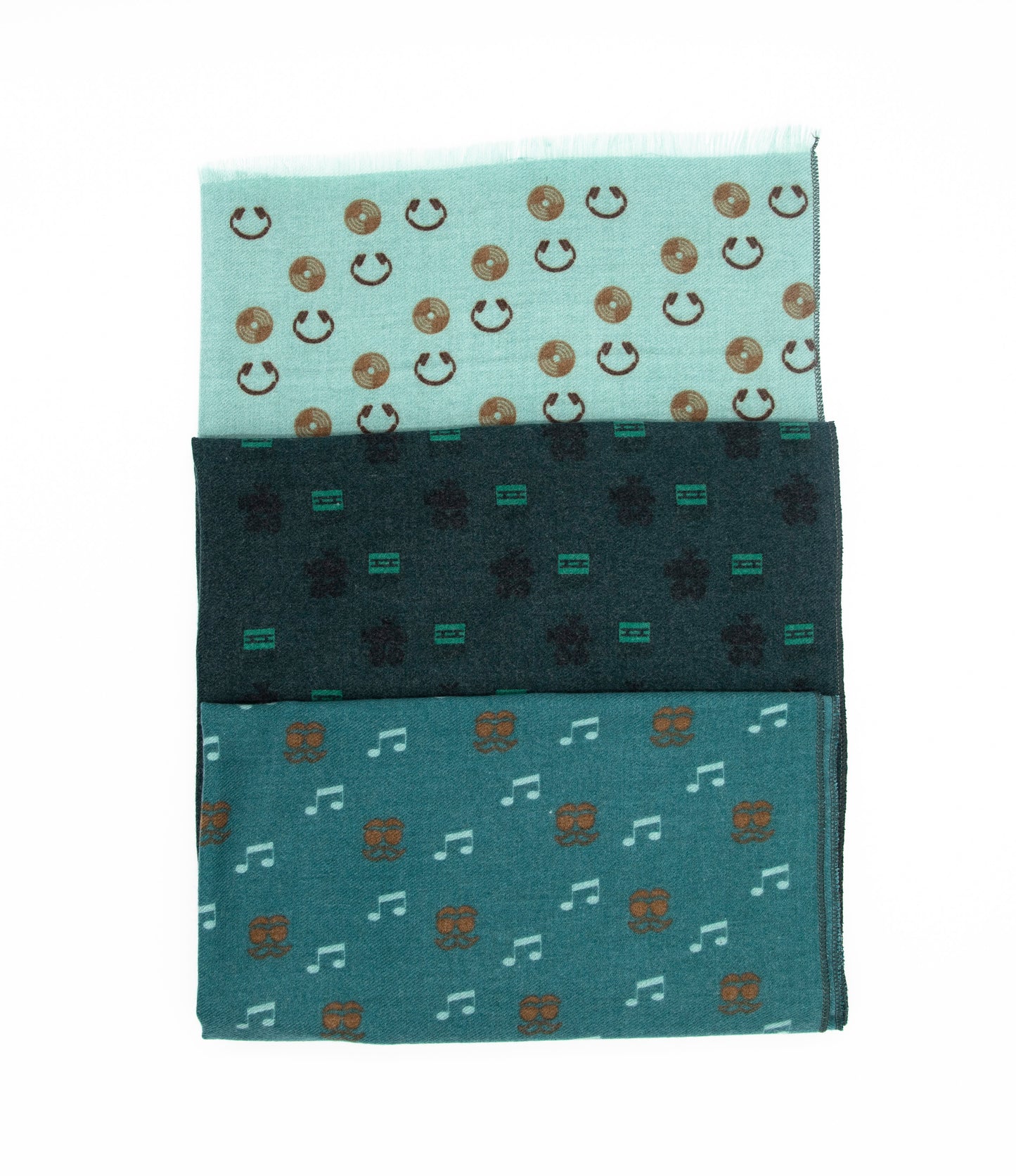 This is a soft and warm cotton scarf for men and for women with unique patterns of headphones, camera and vinyl disc in three shades of green and brown made from a special cotton blend that gives you a wonderful cashmere-like feeling without hurting animals. This is a completely vegan scarf certified by PETA and a perfect gift idea for both men and women.