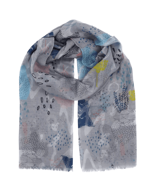 This cotton scarf is our elegant, soft and light scarf for women designed with floral pattern in light grey with elements of yellow, pink, blue and pink colors to give you a happy, fresh and modern look. This is a sustainable and vegan scarf made from 75% cotton and 25% recycled polyester.