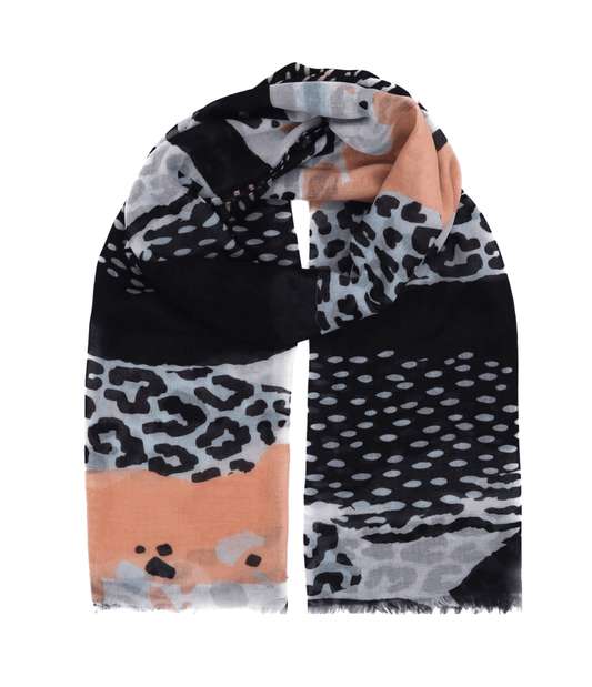 This cotton scarf is our elegant, soft and light scarf for women designed in animal print with panther and zebra design in black, white, rose and light blue colors to give you a happy, fresh and modern look. This is a sustainable and vegan scarf made from 75% cotton and 25% recycled polyester.